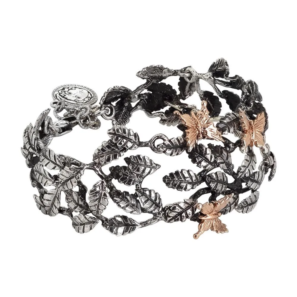 Bracciale semirigido in argento brunito con decoro di foglie di ulivo e farfalle rosate