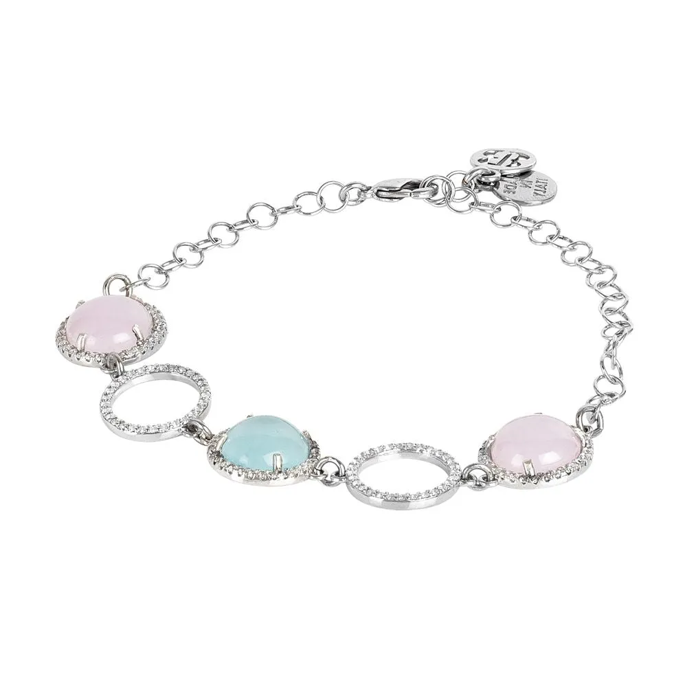 Bracciale con elementi di zirconi e cabochon rosa e celeste gatteggianti