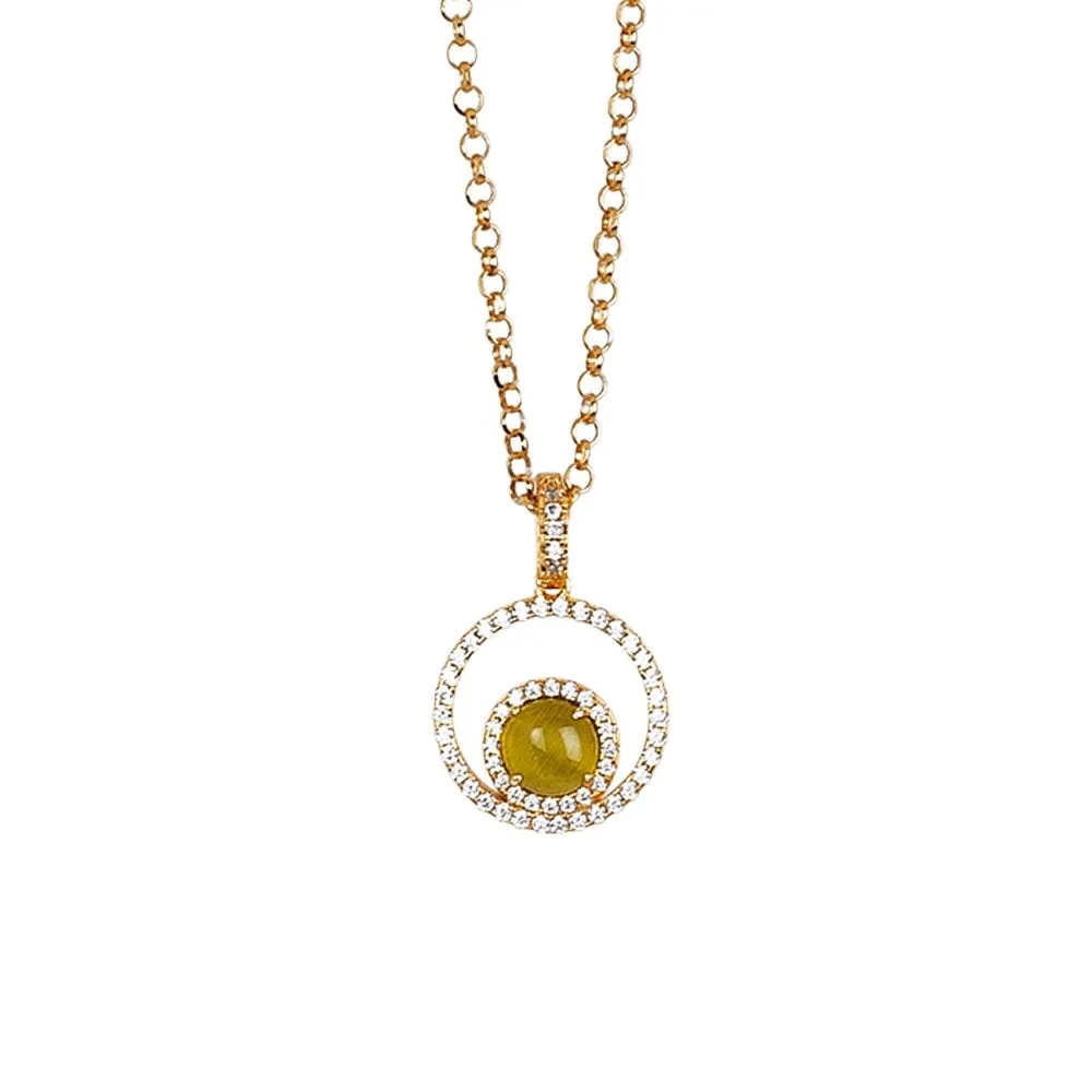 Collana con pendente di zirconi e cabochon verde olivina gatteggiante