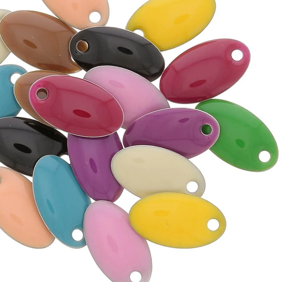 Assortimento di zecchini in resina navetta 14x8 mm - Multicolore x20