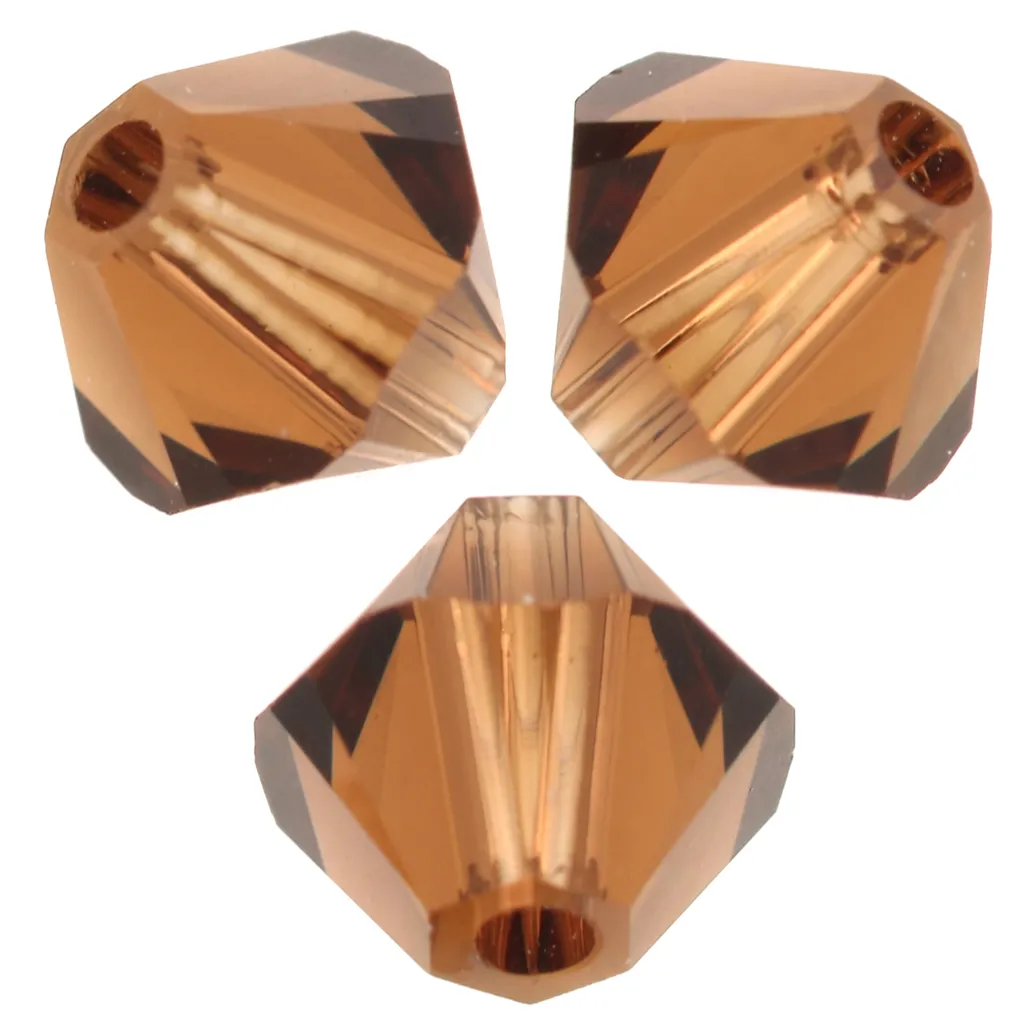 Biconi di cristallo PureCrystal 5328 da 4 mm - Reinvented Smoked Topaz x50