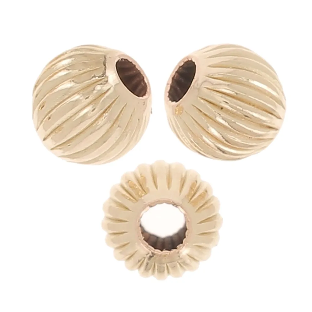 Perline tonde striate da 3 mm - riempite d'oro (oro laminato) x10