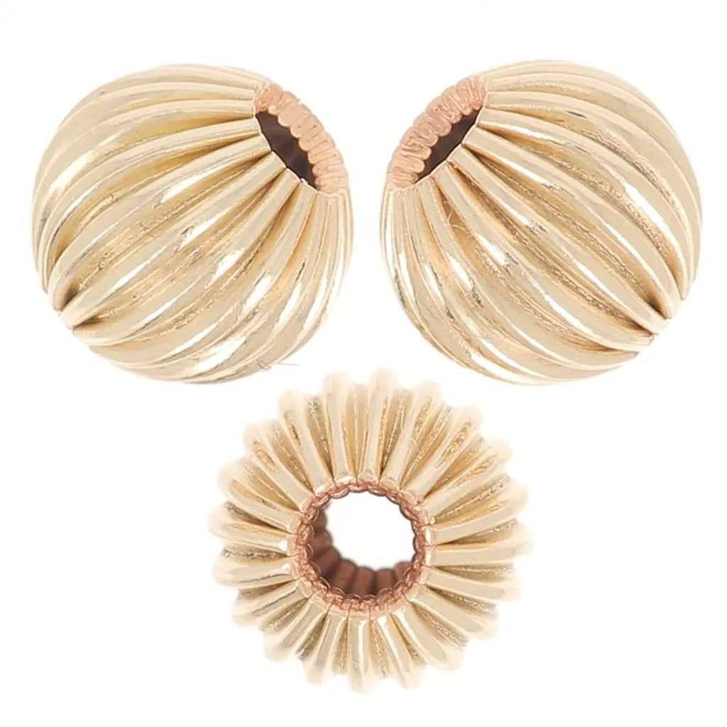 Perline tonde striate da 5 mm - riempite d'oro (oro laminato) x5