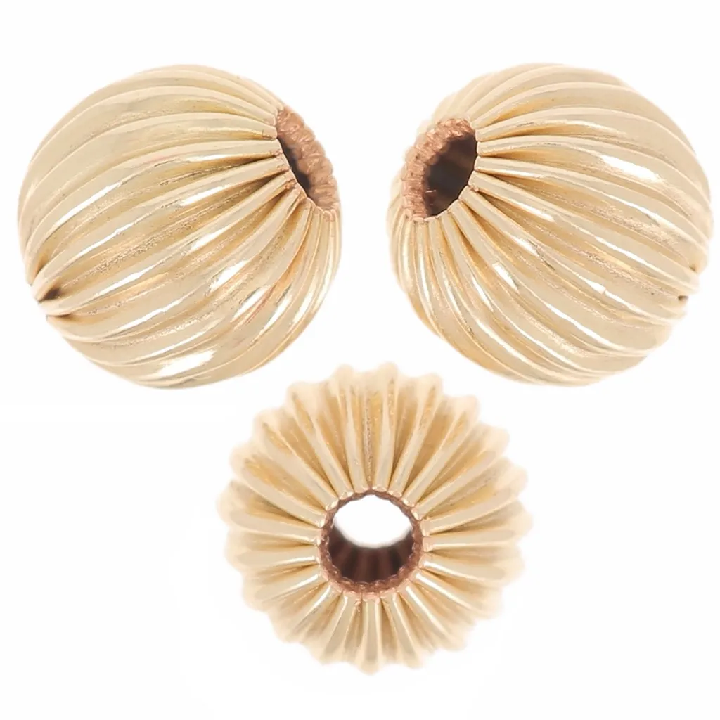 Perline tonde striate da 6 mm - riempite d'oro (oro laminato) x5