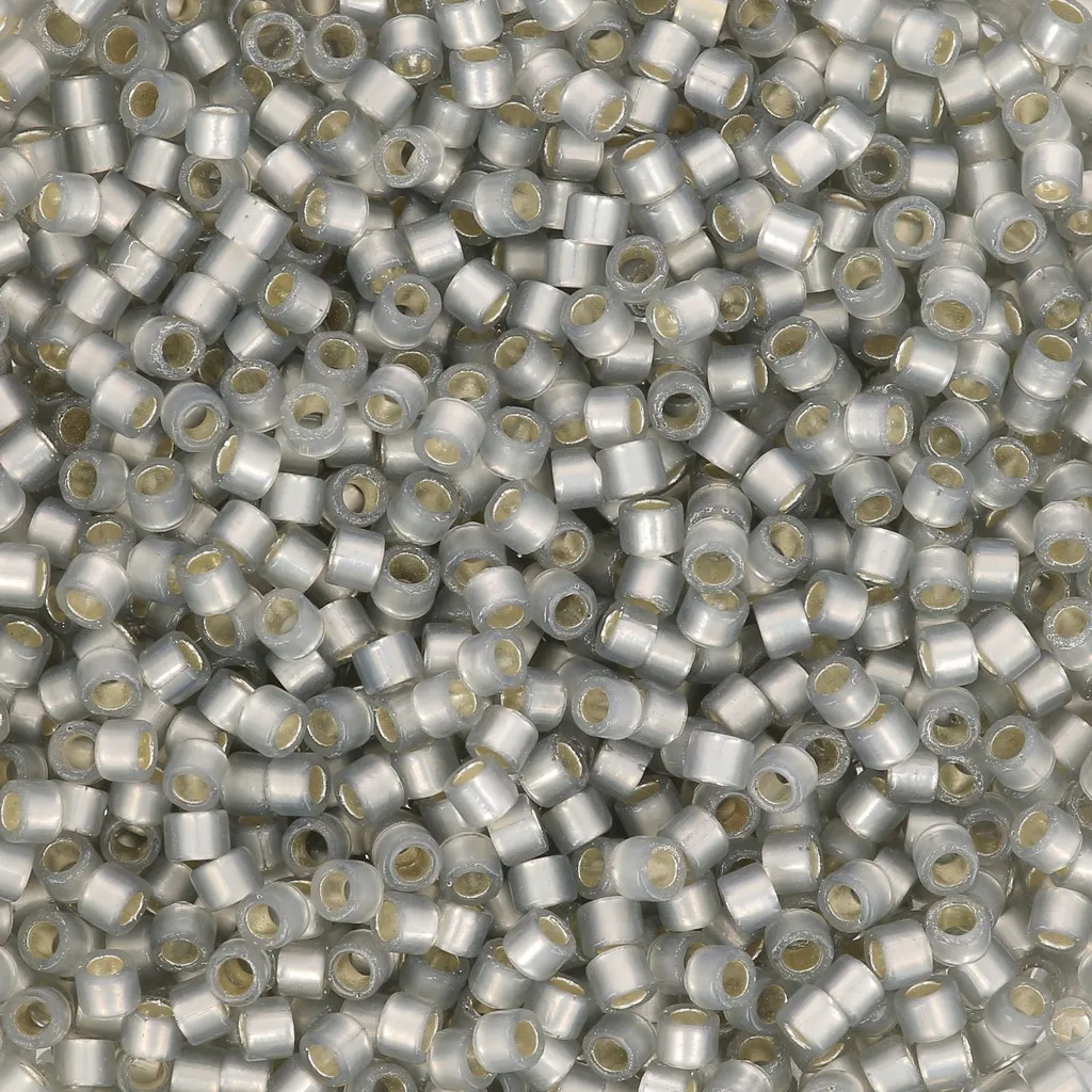 Toho Aiko 11/0 1.6 mm TA012250 - Transparent Silver Lined Milky Topaz Gray x4g