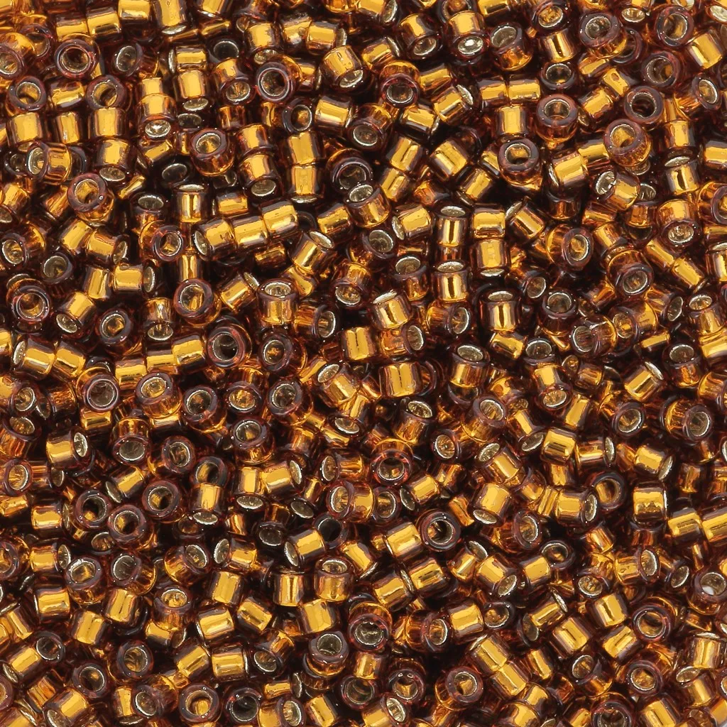 Toho Aiko 11/0 1.6 mm TA0134 - Transparent Silver Lined Smokey Topaz x4g